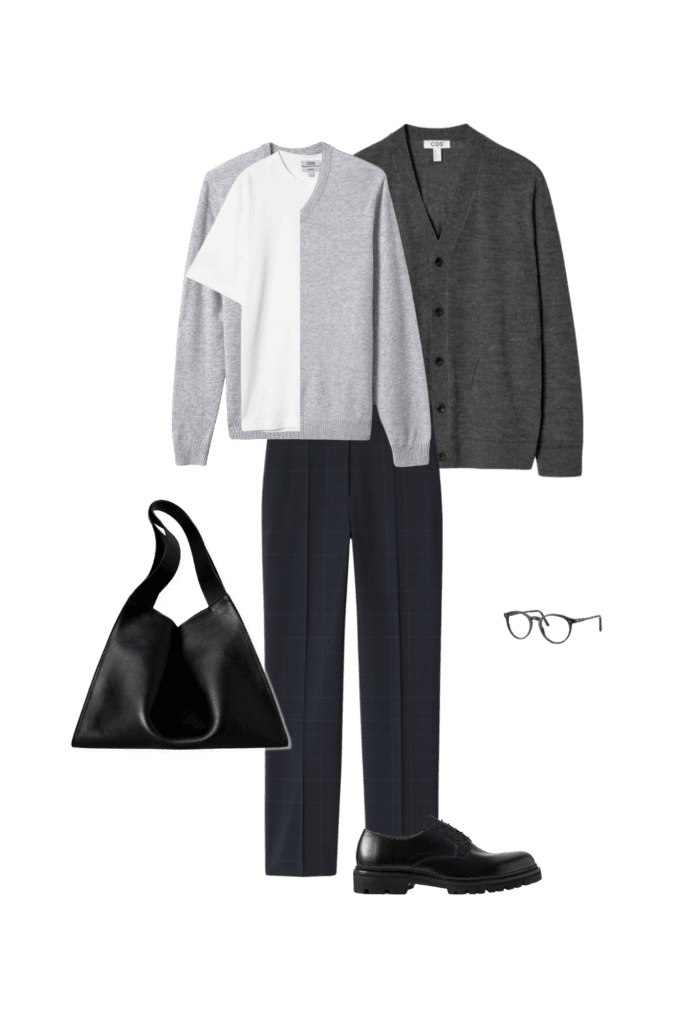 Flat lay of a men's modern minimalist outfit including a gray merino wool V-neck cardigan from COS, light gray cashmere V-neck sweater from Kohls, navy windowpane-check straight-leg trousers from COS, Jacques leather derby shoes from MrPorter, white oversized cotton T-shirt from COS, black leather Alcove tote bag from COS, and shiny transparent blue eyeglasses frame from Polo Ralph Lauren.