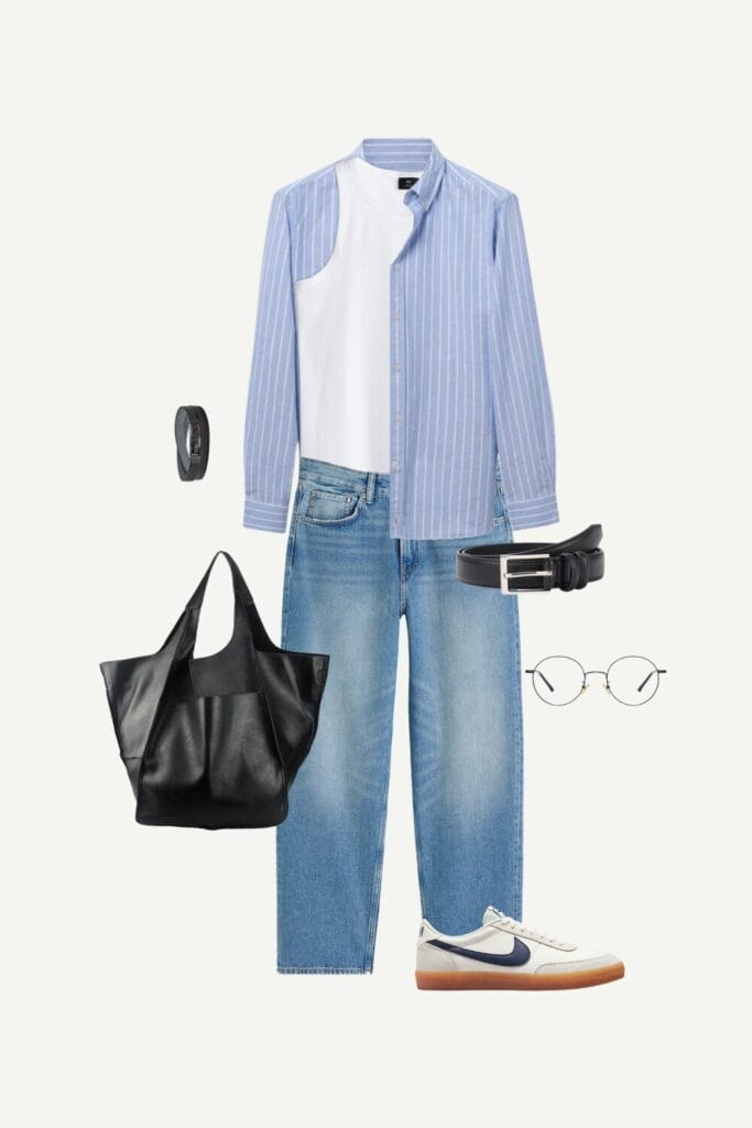 Men’s smart casual summer outfit featuring a blue striped button-up shirt, white ribbed tank top, relaxed fit jeans, black leather tote, retro round eyeglasses, black belt, and white sneakers.