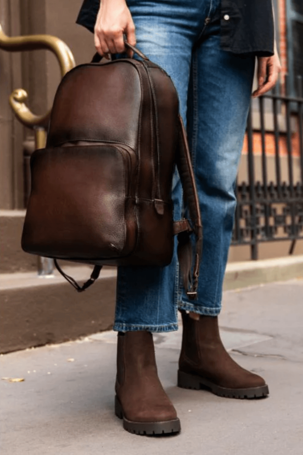 Men Holding Thursday Boots Company Perfecto Backpack in Tan